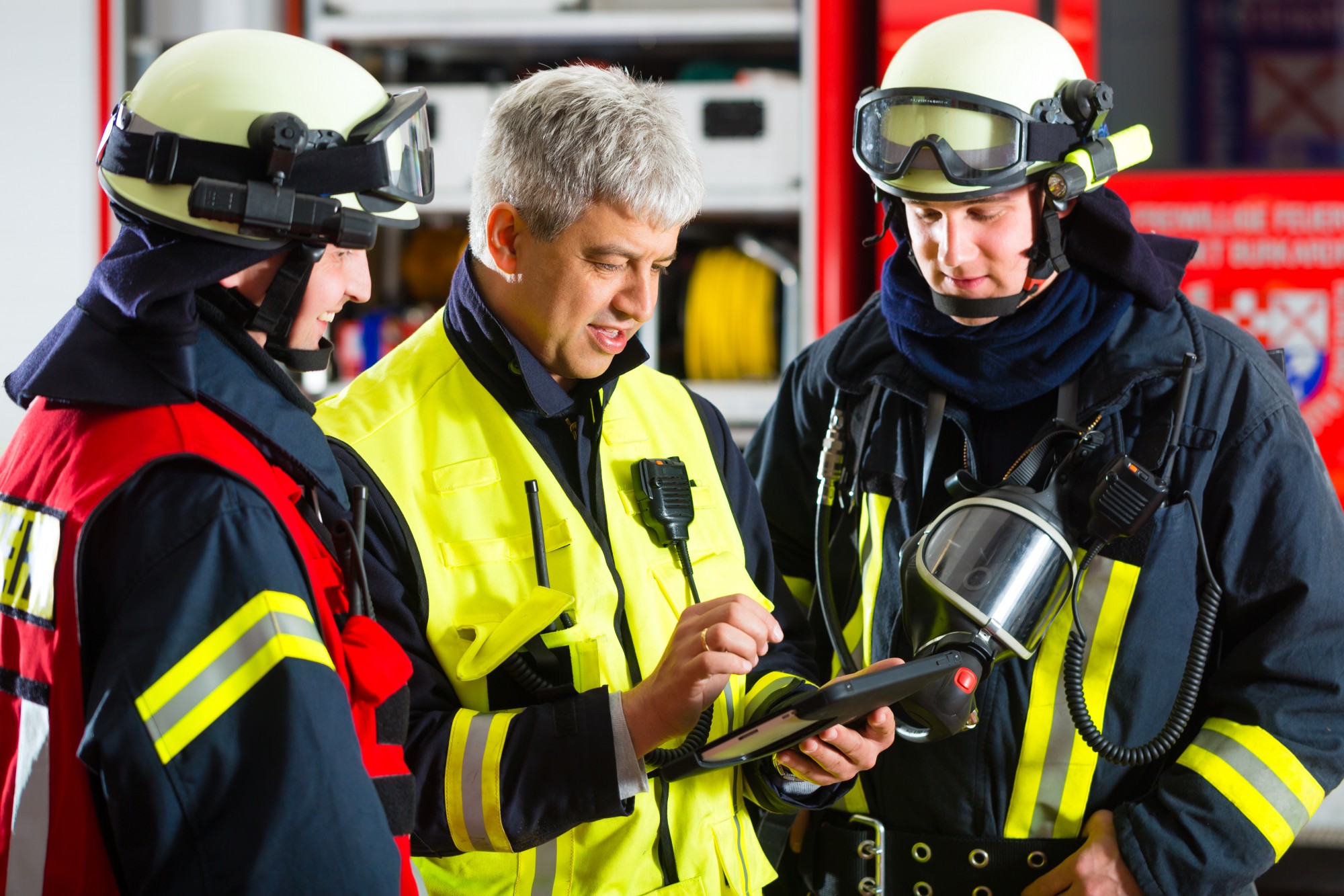 Firefighters working on tablet